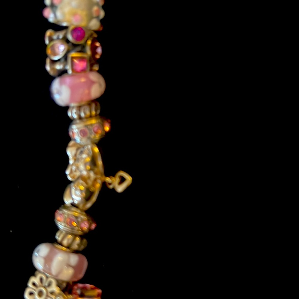 PANDORA bracelet sterling silver with collectible Mickey and Minnie charm.